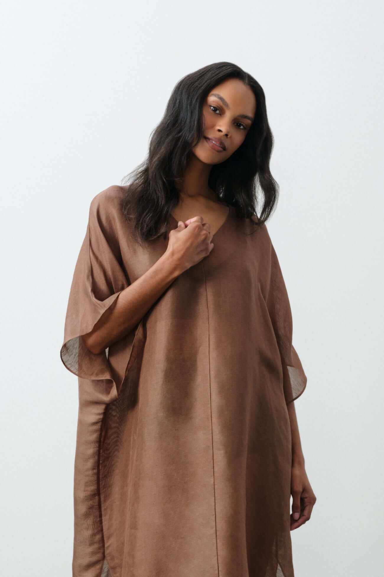 Elegant brown Dresses showcasing a relaxed design, perfect for casual and formal occasions.